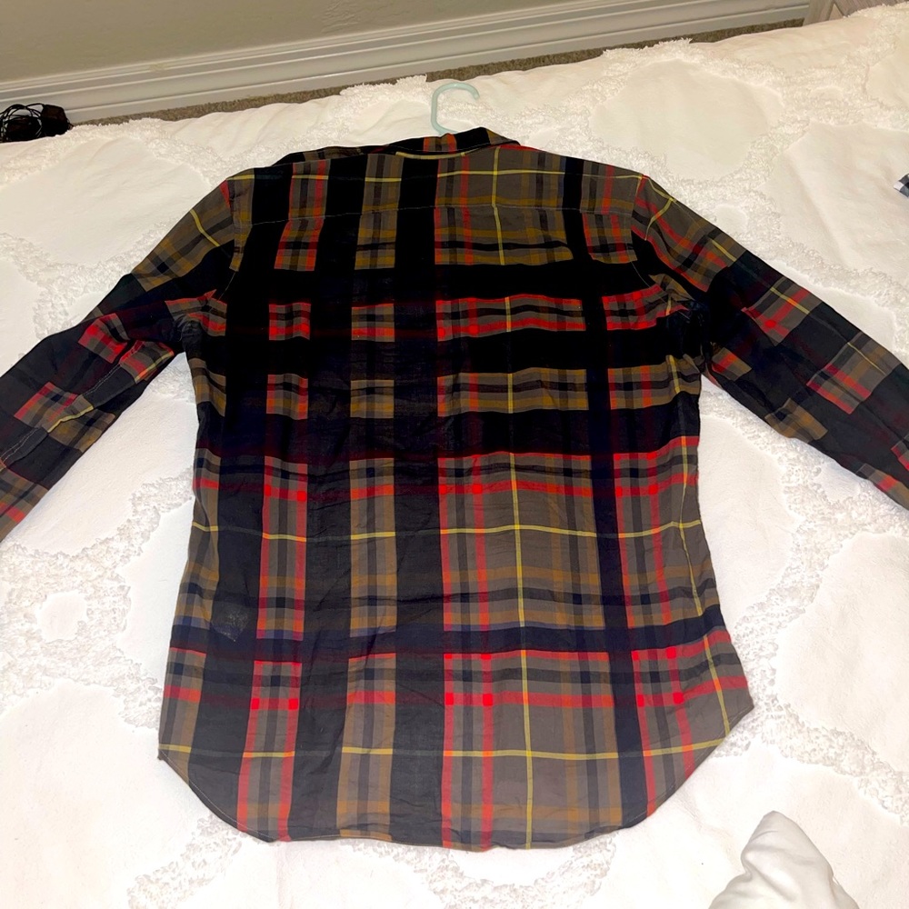 Burberry Brit slim fit button down shirt. I would say like an autumn color.